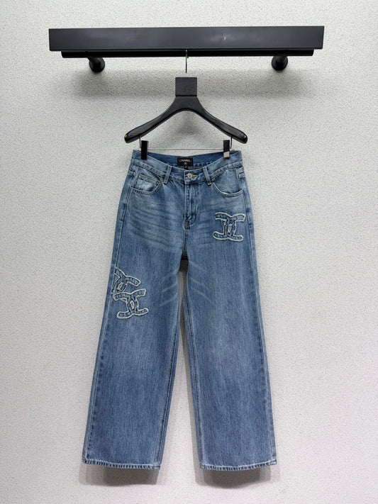 Embroidered logo patch jeans