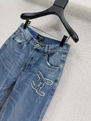 Embroidered logo patch jeans