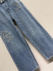 Embroidered logo patch jeans