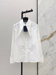 Minimalist white shirt with a long pointed collar