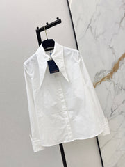 Minimalist white shirt with a long pointed collar