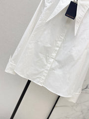 Minimalist white shirt with a long pointed collar