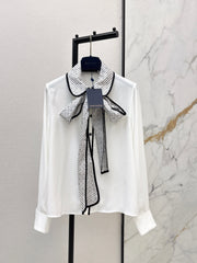 Minimalist white shirt with a long pointed collar