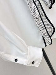 Minimalist white shirt with a long pointed collar