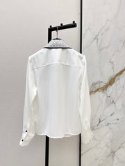 Minimalist white shirt with a long pointed collar