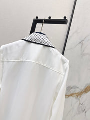 Minimalist white shirt with a long pointed collar
