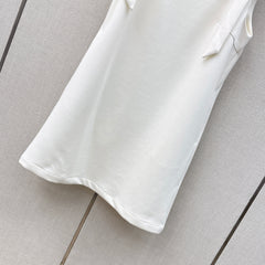 Sleeveless dress with bow-tie shoulder straps