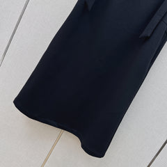 Sleeveless dress with bow-tie shoulder straps