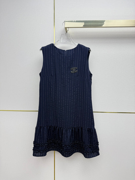 Beige vest dress with contrasting leather label