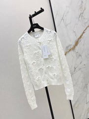 Bow-tie quilted jacquard openwork sweater