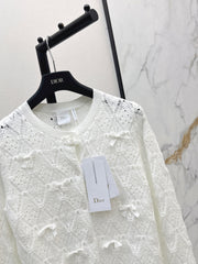 Bow-tie quilted jacquard openwork sweater