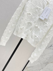Bow-tie quilted jacquard openwork sweater