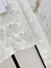 Bow-tie quilted jacquard openwork sweater