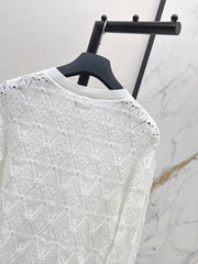 Bow-tie quilted jacquard openwork sweater