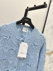 Bow-tie quilted jacquard openwork sweater