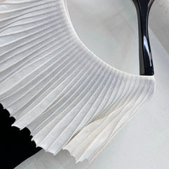 Black and white color-blocked knitwear