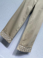 Khaki rolled-up denim jeans