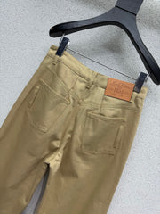 Khaki rolled-up denim jeans