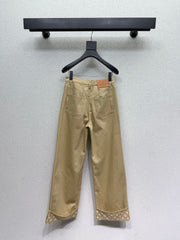 Khaki rolled-up denim jeans