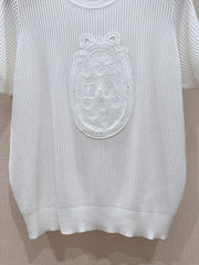 Hollow-out lace knit short-sleeved top