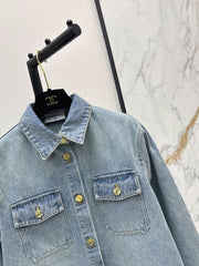 Gold-button denim shirt