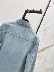Gold-button denim shirt