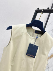 Sleeveless dress with a "faux-layered" design