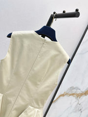 Sleeveless dress with a "faux-layered" design