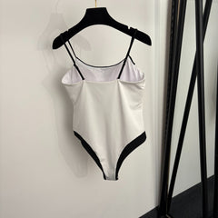 Black and white color-block halter one-piece swimsuit