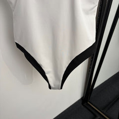 Black and white color-block halter one-piece swimsuit