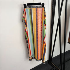 Colorful striped camisole + color-block beach skirt