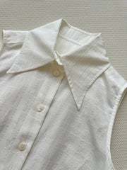 Minimalist French-style sleeveless shirt