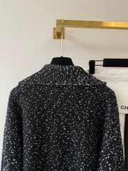 Solid-color long-sleeve knit top with a collar