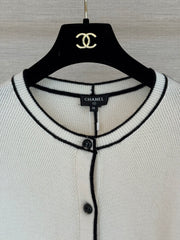 Color-block knit cardigan featuring a nautical-style collar