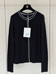 Color-block knit cardigan featuring a nautical-style collar