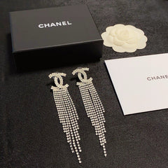 Long, fully paved rhinestone tassel earrings