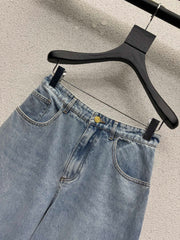 Wide-leg denim trousers