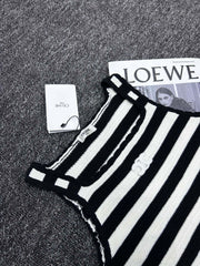 Striped vest with wavy edges