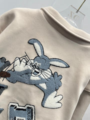 Playful cartoon baseball jacket.