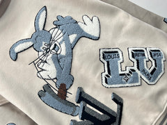 Playful cartoon baseball jacket.