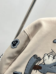 Playful cartoon baseball jacket.