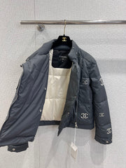 Hollowed-out, seam-sealed short down jacket