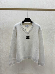 Heavy-duty beaded and sequined V-neck knit long-sleeved top