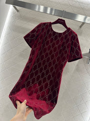 Red dress with rhinestone lettering