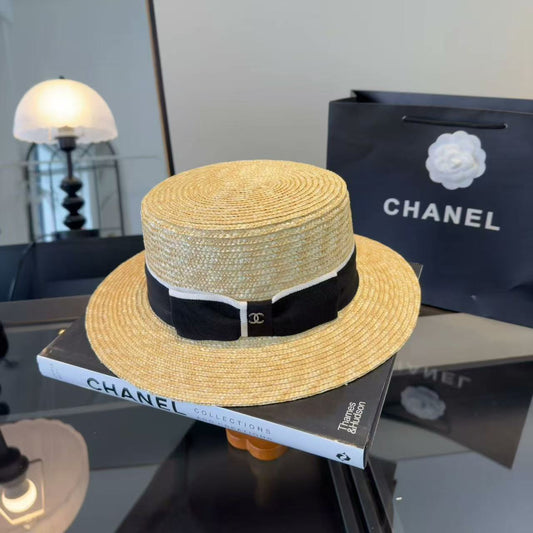 Straw hat with a bow