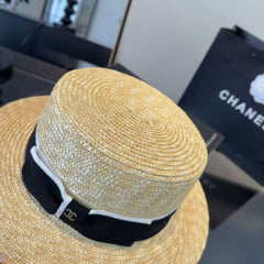Straw hat with a bow