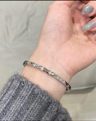 Narrow diamond-patterned bangle