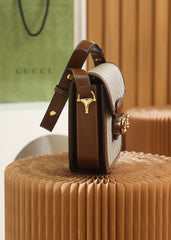 Horsebit shoulder bag