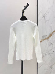 Solid-color long-sleeve knit top