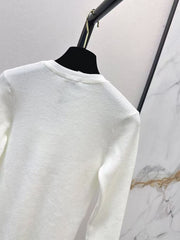 Solid-color long-sleeve knit top